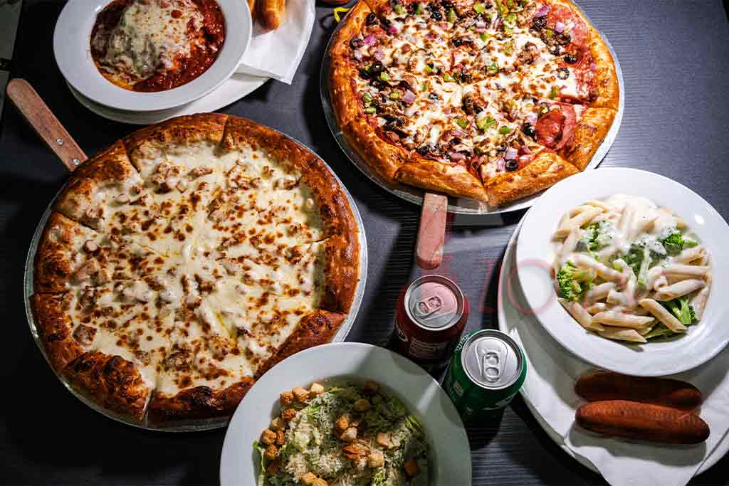 A variety of delicious dishes at Zio Al’s, including pizza, pasta, wings, salads, and subs, all made with fresh ingredients. Open daily until 3 AM.